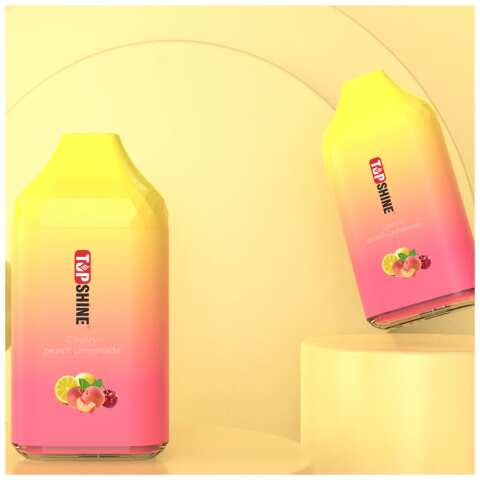 A Cherry Peach Lemonade Top Shine ULTRA Flavor Description Flavor: Cherry Peach Lemonade Top Shine ULTRA flavor is a tantalizing blend of ripe cherries, juicy peaches, and tangy lemonade. Experience the delightful fusion of these flavors in Cherry Peach Lemonade by Top Shine ULTRA, delivering a burst of fruity and refreshing goodness with every puff. by Vape4Less.