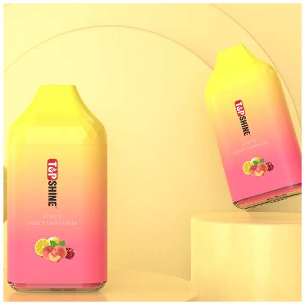 A Cherry Peach Lemonade Top Shine ULTRA Flavor Description Flavor: Cherry Peach Lemonade Top Shine ULTRA flavor is a tantalizing blend of ripe cherries, juicy peaches, and tangy lemonade. Experience the delightful fusion of these flavors in Cherry Peach Lemonade by Top Shine ULTRA, delivering a burst of fruity and refreshing goodness with every puff. by Vape4Less.