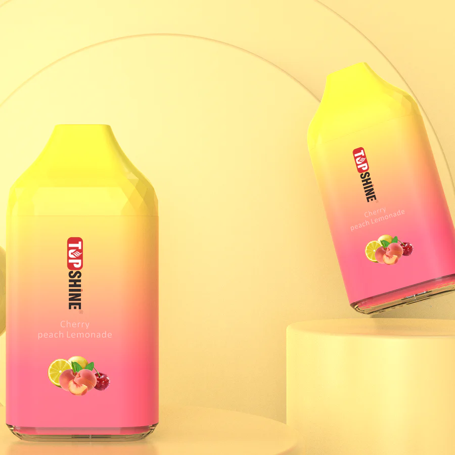 A Cherry Peach Lemonade Top Shine ULTRA Flavor Description Flavor: Cherry Peach Lemonade Top Shine ULTRA flavor is a tantalizing blend of ripe cherries, juicy peaches, and tangy lemonade. Experience the delightful fusion of these flavors in Cherry Peach Lemonade by Top Shine ULTRA, delivering a burst of fruity and refreshing goodness with every puff. by Vape4Less.
