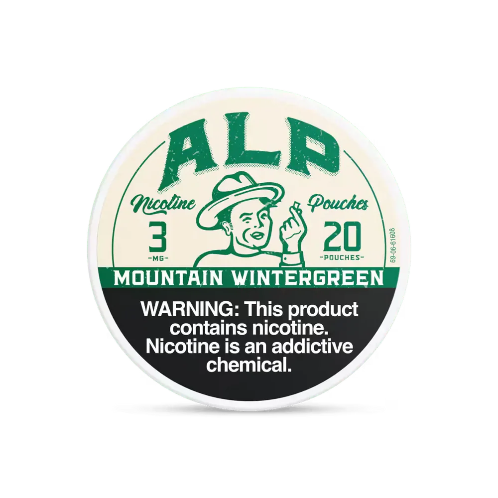 Mountain Wintergreen ALP Nicotine Pouches Mountain Wintergreen ALP Nicotine Pouches can with bold wintergreen mint graphics and slim tobacco-free pouch packaging on white background.